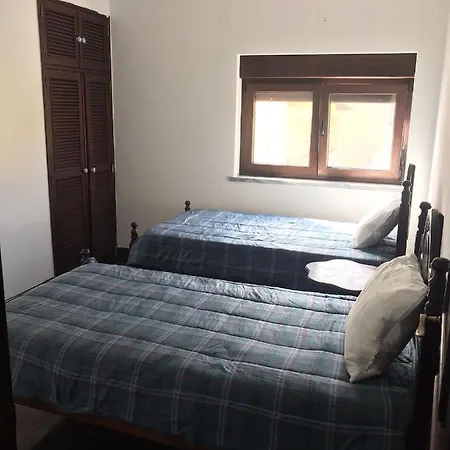 Δωμάτια σε οικογενειακή κατοικία Quartos Privados *
